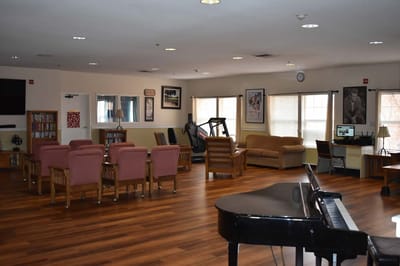 Common area with seating and piano