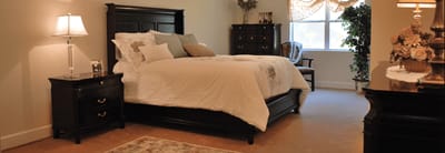 Cozy private resident room with a bed and decor