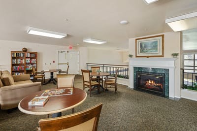 Cozy common area with seating and puzzle activities