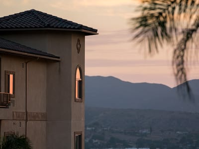 Close-up of the facility building at sunset
