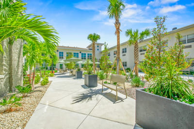 Lush garden area with pathways and seating