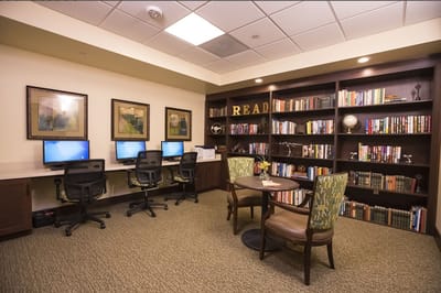 Interior library space with computers and bookshelves