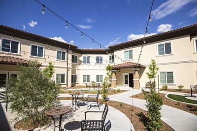 Outdoor garden area with seating and walkways