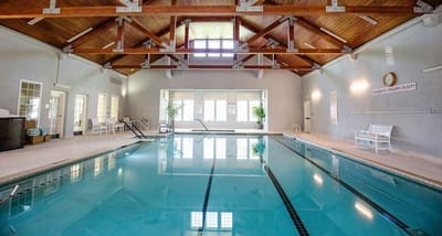 Indoor swimming pool in a well-lit facility