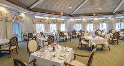 Elegant dining room setup with floral decor