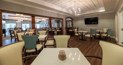 Interior dining area with tables and chairs