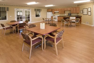 Bright common area with tables and chairs
