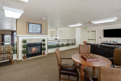 Common area with seating and a fireplace