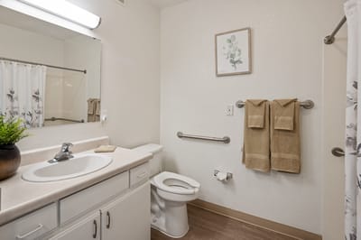 Clean bathroom with modern fixtures and decor
