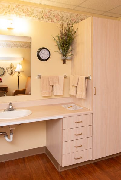 Well-lit resident bathroom with modern fixtures
