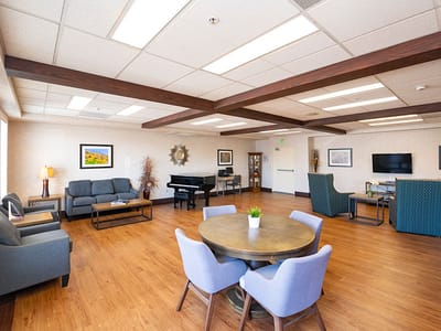 Common area with seating arrangements and piano