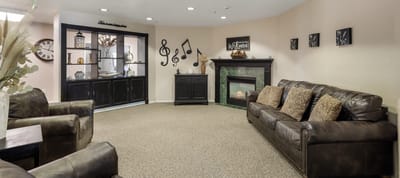Cozy common area with comfortable seating and music decor