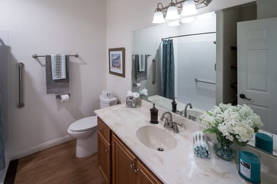 Bright and modern bathroom with floral decor