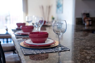 Table set with dinnerware in a dining room