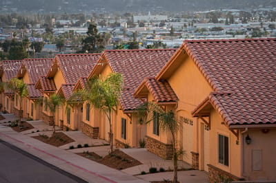 Row of residential buildings with tiled roofs