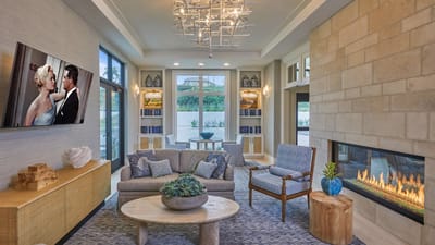Bright common area with comfortable seating and fireplace