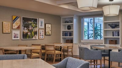 Interior view of a dining area with tables and decor