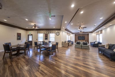 Common area with seating and clock on the wall