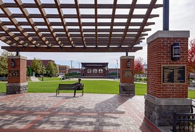 A public park with seating and trees