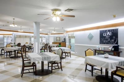 Dining area with tables and chairs set up