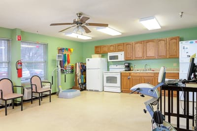 Bright interior of a common area with exercise equipment