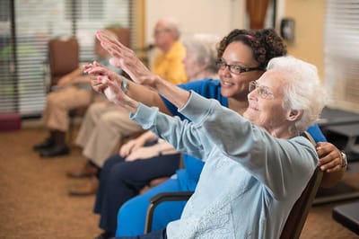Residents and staff enjoying an activity together