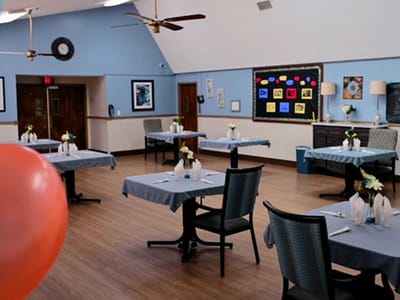 Dining area set up for meals with decorations