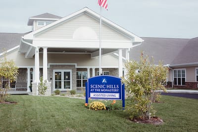 The Villages at Oak Ridge, Nursing Home in Washington, IN — Entrance of a senior living facility with a sign