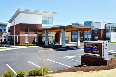 Exterior view of a senior living facility with entrance
