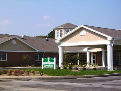 Springhurst Health Campus, Nursing Home in Greenfield, IN — Entrance of Springhurst Health Campus with landscaping and sign
