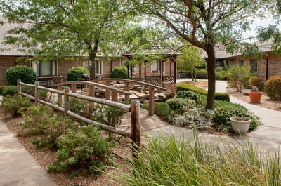 Beautiful garden area with wooden bridge