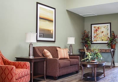 Interior of a cozy living area with seating and decor
