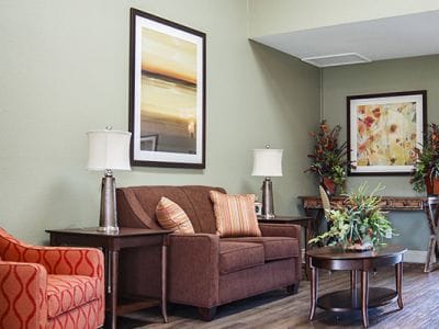 Bright and inviting common area with seating and decor