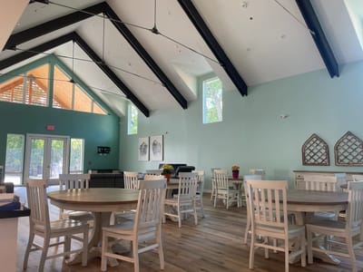 Bright and airy common area with large windows