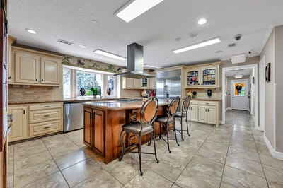 Bright kitchen area with elegant design and seating