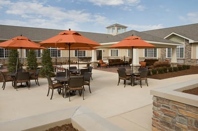 Outdoor patio with seating and umbrellas