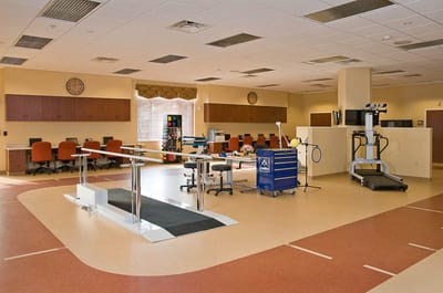 Therapy room with equipment and workstations