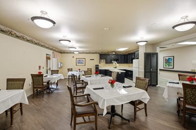 Bright dining area with tables set for meals