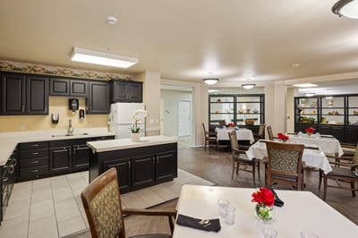 Interior view of dining area with table settings