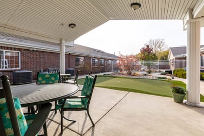 Outdoor seating area with landscaped garden