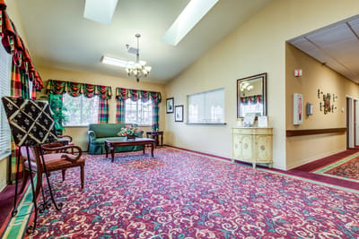 Bright common area with seating and decorative accents
