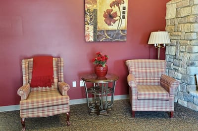 Cozy common area with armchairs and decorative elements