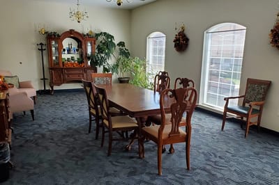 Common area with dining table and chairs