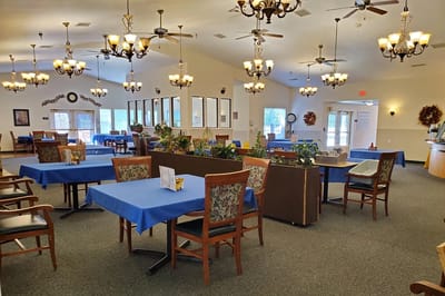 Interior view of the dining room with tables and chairs