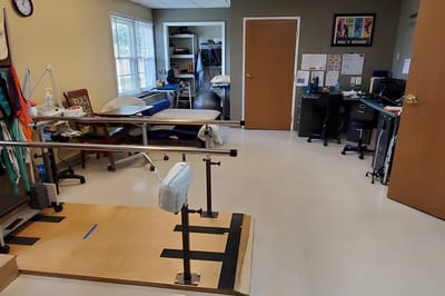 Interior of a therapy room with equipment and furniture