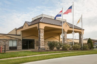 Exterior view of Life Care Center of Bridgeton with flags