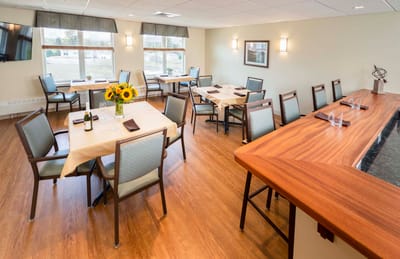 Bright dining area with tables set for meals