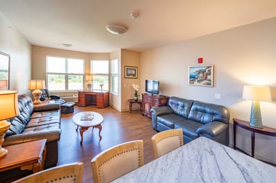 Cozy common area with comfortable seating and warm lighting