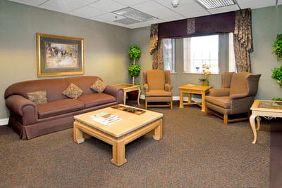 Common area with seating and decorative accents
