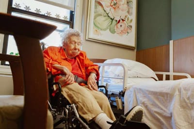 Senior resident sitting in a room